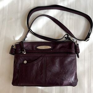 Leather imitation Women petite purse for every day use.  Very light weight.